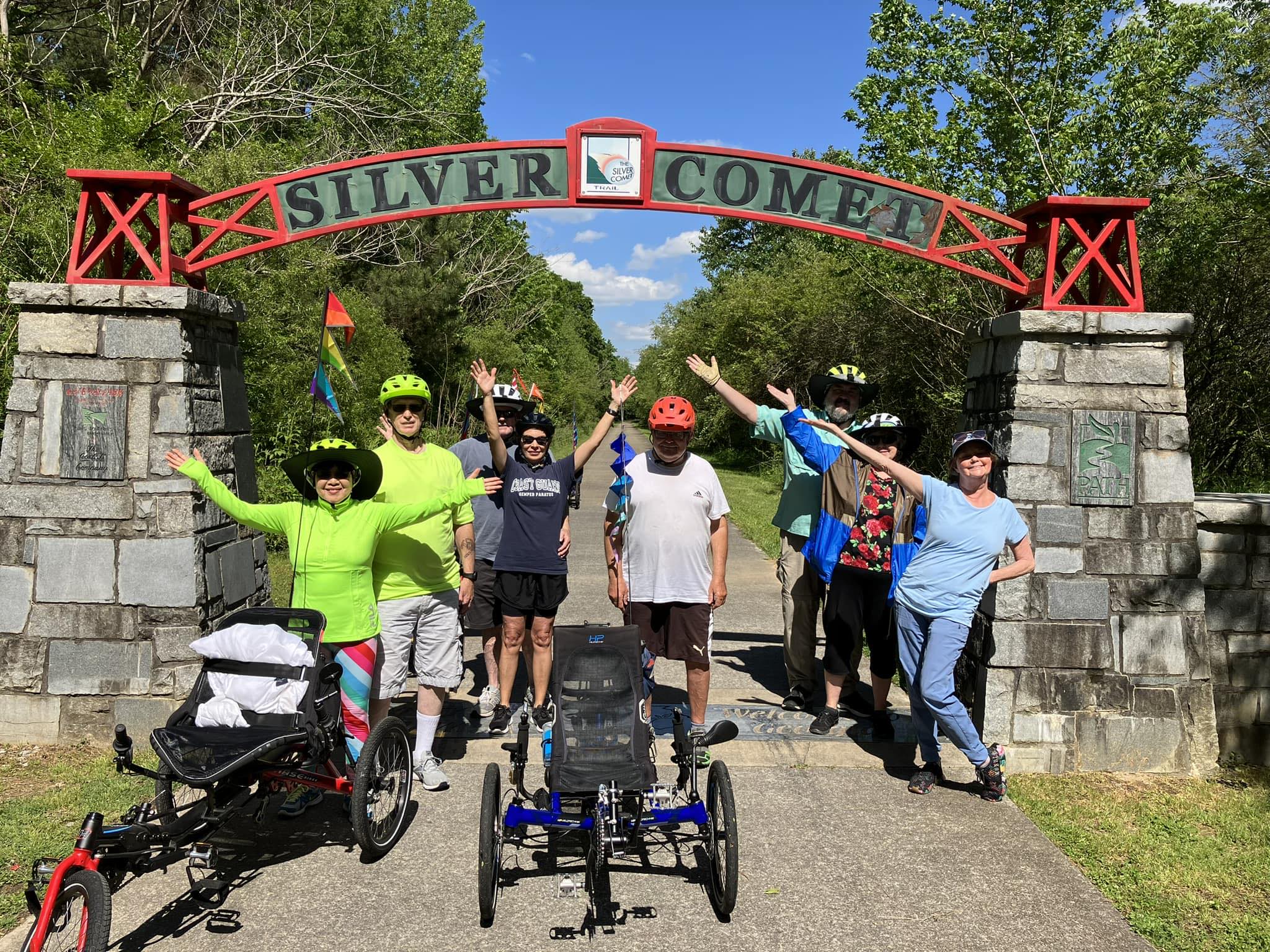 Customers laughing together at a Rocket City Trikes event